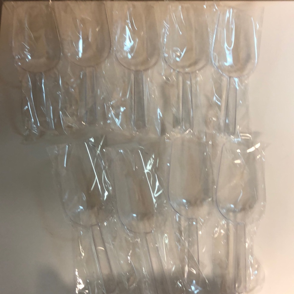 Lot of 10 new serving spoons